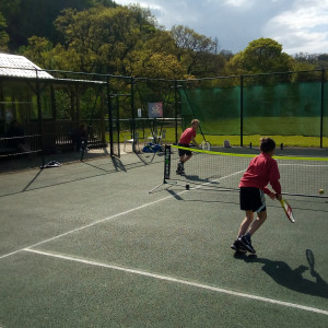 Boys playing tennis