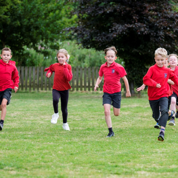 Pupils Running on Field